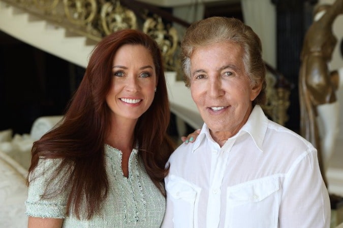 Alvin Malnik and his wife Nancy Elaine Gresham  in white clothes